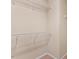 Walk-in closet providing ample storage with wire shelving and carpet flooring at 4909 Jelynn St, Raleigh, NC 27616