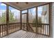 Screened porch providing the perfect outdoor living and entertaining space at 4909 Jelynn St, Raleigh, NC 27616
