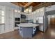 Bright, updated kitchen boasts custom cabinets, stainless appliances and unique island with marble countertop at 500 N Duke St # 55-103, Durham, NC 27701