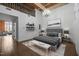 Modern bedroom featuring a chandelier, exposed beams and a lofted area at 500 N Duke St # 55-103, Durham, NC 27701