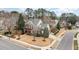 Aerial view of a home with a well-manicured lawn and mature trees at 5000 Sears Farm Rd, Cary, NC 27519