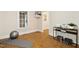Bright, well-lit bonus room featuring hardwood floors and modern decor at 5204 Winter Holly Ct, Raleigh, NC 27606