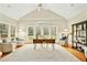 Bright, spacious office with large windows, vaulted ceilings, hardwood floors, and lots of natural light at 5204 Winter Holly Ct, Raleigh, NC 27606