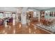 Open-concept living spaces with hardwood floors, archways, and a seamless flow between rooms at 5512 Spring Bluffs Ln, Raleigh, NC 27606