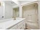 Bathroom featuring vanity with white countertop and shower tub at 6065 Merion Cir, Sanford, NC 27332