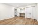 Bright bedroom featuring a built-in desk, closet space and wood-look flooring at 6065 Merion Cir, Sanford, NC 27332