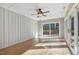 Bright sun room featuring a ceiling fan and sliding glass doors to the outside at 6065 Merion Cir, Sanford, NC 27332