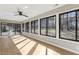 Bright sun room featuring a ceiling fan, recessed lighting, and lots of windows at 6065 Merion Cir, Sanford, NC 27332