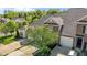 A well-maintained home with a brick facade, two-car garage, manicured lawn, and mature trees offering curb appeal at 638 Village Lake Dr, Mebane, NC 27302