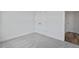 Bedroom featuring neutral carpet and closet with doors at 962 Spring Hill Church Rd, Lillington, NC 27546