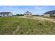 Newly built single-Gathering home featuring a spacious front yard in a rural neighborhood at 962 Spring Hill Church Rd, Lillington, NC 27546