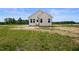 Exterior with siding and a lawn at 962 Spring Hill Church Rd, Lillington, NC 27546