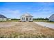 Lovely one-story home with large front yard and a welcoming facade at 962 Spring Hill Church Rd, Lillington, NC 27546