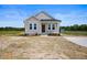 Delightful one-story home boasting a cozy front porch and attractive design at 962 Spring Hill Church Rd, Lillington, NC 27546