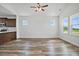 Spacious living room with sleek flooring and ample natural light at 962 Spring Hill Church Rd, Lillington, NC 27546