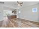 Open-concept living area with view to a kitchen, providing a spacious and airy atmosphere at 962 Spring Hill Church Rd, Lillington, NC 27546
