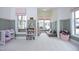 Open bedroom with sitting area, large windows offering plenty of natural light at 1005 Whistler St, Durham, NC 27713