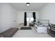 Charming bedroom featuring a twin bed, comfortable carpet, and plenty of natural light at 1005 Whistler St, Durham, NC 27713