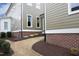 Exterior view of home with tasteful landscaping, showcasing the well-maintained yard and property at 1005 Whistler St, Durham, NC 27713