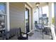 Charming porch with swing, chairs and table perfect for enjoying outdoor relaxation at 1005 Whistler St, Durham, NC 27713