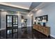 Welcoming lobby featuring a decorative mirror, console table, and eye-catching wall art at 101 Hiddenite Pl, Holly Springs, NC 27540