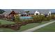 Community pool area featuring a pool, pergola, and timber framed gathering area at 101 Hiddenite Pl, Holly Springs, NC 27540