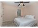 Bedroom with neutral-colored walls, carpeted floors and a window with blinds at 1018 Tranquil Creek Way, Wake Forest, NC 27587