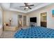 This main bedroom has a ceiling fan, neutral colored walls, and access to the bathroom at 1018 Tranquil Creek Way, Wake Forest, NC 27587