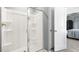 Modern bathroom with glass enclosed shower featuring a white shower stall at 102 Saddle Mare St, Clayton, NC 27520