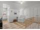 Inviting Bedroom with neutral tones, natural light, and a small rocking chair at 104 Pinecroft Dr, Raleigh, NC 27609