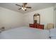 Bedroom featuring a ceiling fan and mirror, with ample natural light from the window at 1103 Driftwood Dr, Siler City, NC 27344