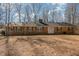 Charming one-story brick home featuring a well-maintained lawn and a classic architectural style at 1103 Driftwood Dr, Siler City, NC 27344