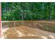 Backyard deck overlooking a wooded area at 112 Ridgepath Way, Cary, NC 27511