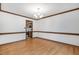 Bright dining room with hardwood floors and decorative chandelier lighting at 112 Ridgepath Way, Cary, NC 27511