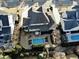 Overhead view of a home with a pool, landscaping, and neighboring houses in a suburban setting at 113 Hardy Oaks Way, Holly Springs, NC 27540