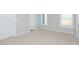 Bright bedroom with carpet and natural light from large windows at 132 Ambergate Ct, Rocky Mount, NC 27804