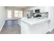 Bright kitchen with granite countertops, stainless steel appliances, and island at 132 Ambergate Ct, Rocky Mount, NC 27804