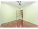 Cozy bedroom with hardwood floors and views into the Primary bathroom at 148 Evington Dr, Pittsboro, NC 27312
