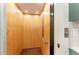 Residential elevator featuring wooden walls, interior lighting, and convenient accessibility at 148 Evington Dr, Pittsboro, NC 27312