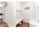 Functional mudroom with built-in bench, hooks, and storage cabinets at 148 Evington Dr, Pittsboro, NC 27312