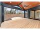 Covered porch with wood flooring and great outdoor view; perfect for relaxing and entertaining at 148 Evington Dr, Pittsboro, NC 27312