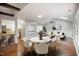 Dining area boasts a stylish table, chairs, and seamless transition to the kitchen and living room at 1512 Maybrook Dr, Raleigh, NC 27610