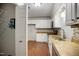 Bright kitchen with modern appliances, tile backsplash, and ample cabinet space at 1512 Maybrook Dr, Raleigh, NC 27610