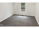 Bedroom featuring gray carpet and natural light from window at 1515 Indian Camp Rd, Chapel Hill, NC 27516
