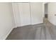 Bedroom features gray carpet and a double door closet at 1515 Indian Camp Rd, Chapel Hill, NC 27516