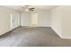 Spacious living room with plush carpeting and ample natural light at 1515 Indian Camp Rd, Chapel Hill, NC 27516
