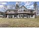 Multi-level home with a deck and lots of windows on a beautiful lot at 161 Kerr Lake Club Dr, Henderson, NC 27537