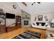 Spacious living room featuring a cozy fireplace and stylish decor at 161 Kerr Lake Club Dr, Henderson, NC 27537