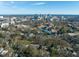 Scenic view of the cityscape from a tree-filled neighborhood showcasing city living in a natural environment at 201 W Park Dr, Raleigh, NC 27605