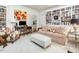 Bright living room features built-in bookshelves, a desk, and plenty of natural light at 201 W Park Dr, Raleigh, NC 27605